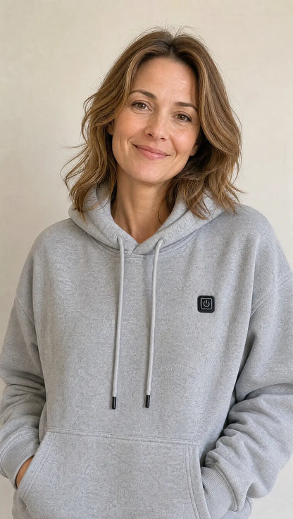 Woman wearing the Grey EmberNest Heated Hoodie
